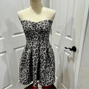 Sans Souci sleeveless, pleated, zip back rose floral, fit and flare mini dress